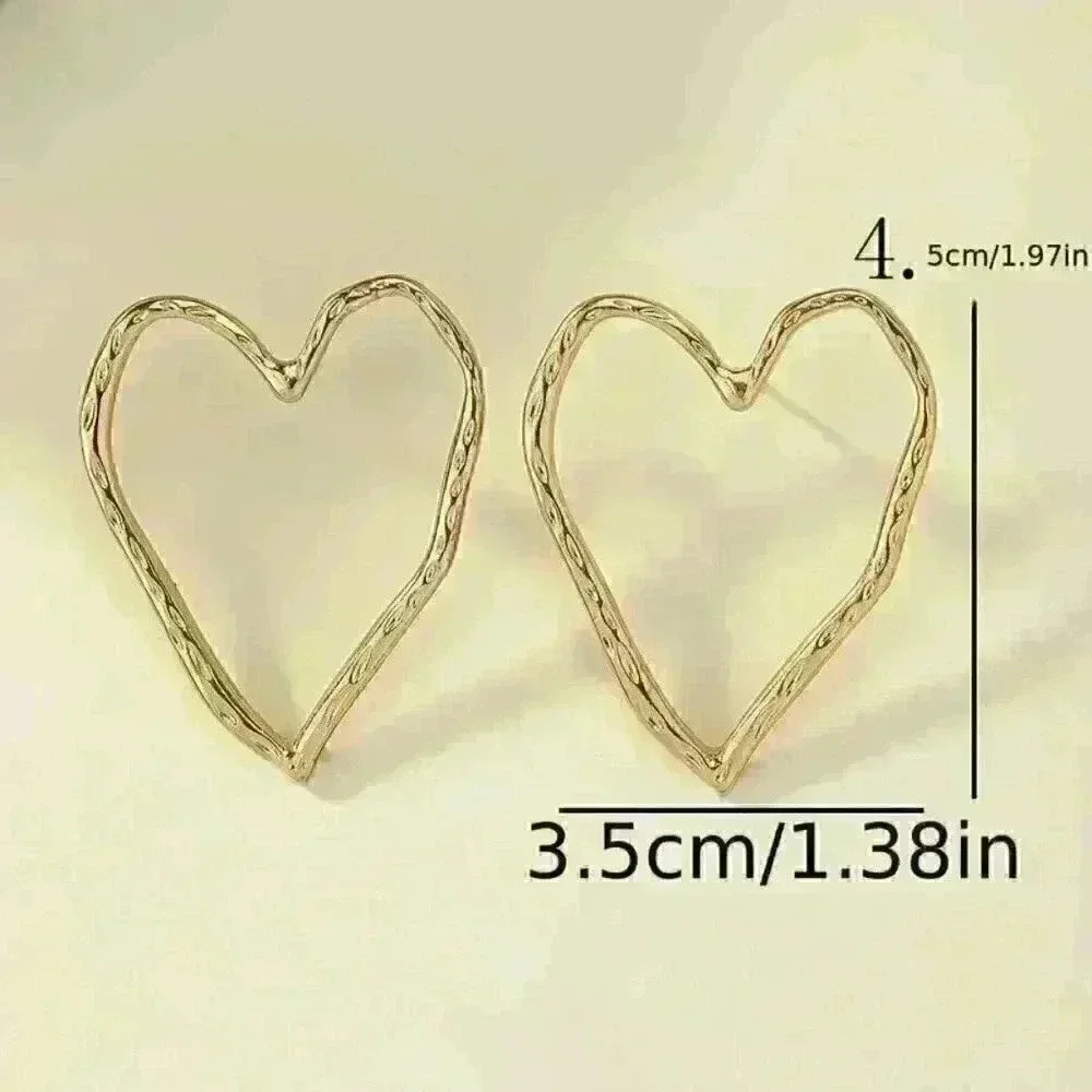 Hollow Heart Shaped Stud Earrings - Picture 5 of 5